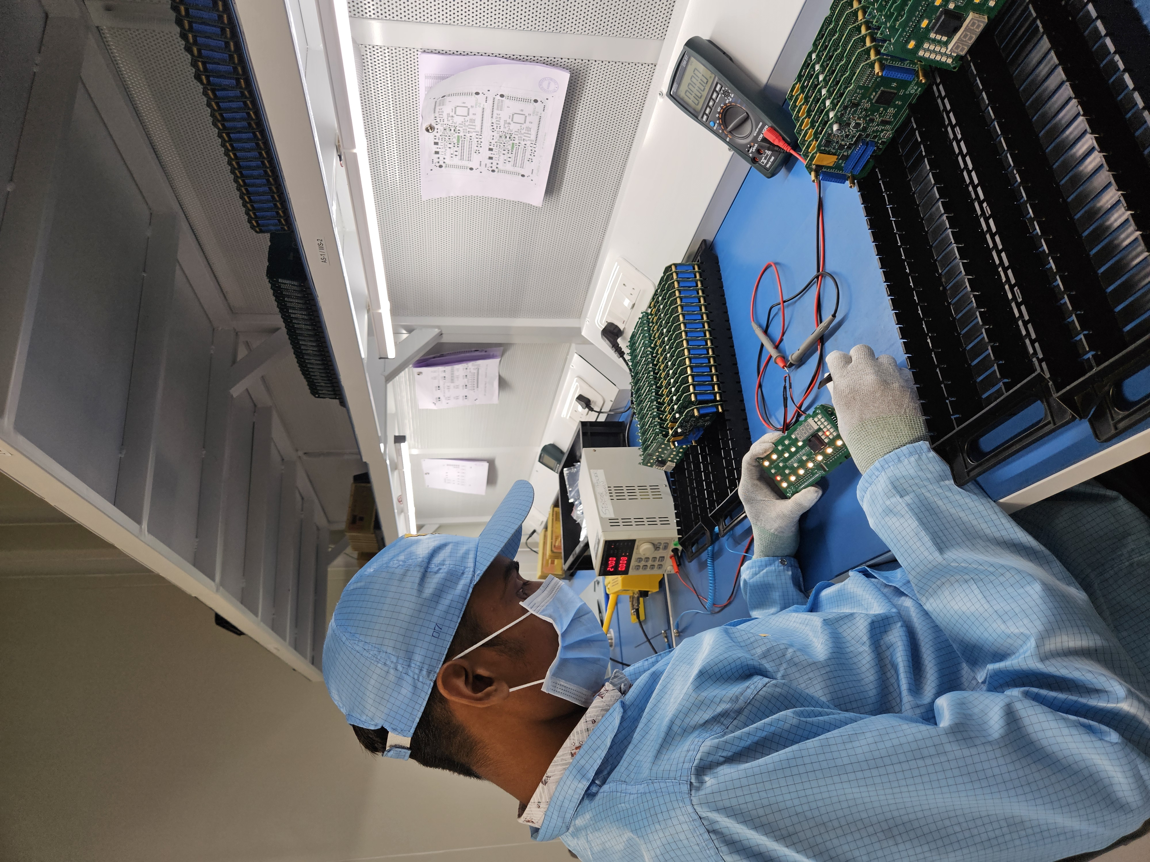 SMT pick and place robotic arm on the assembly line